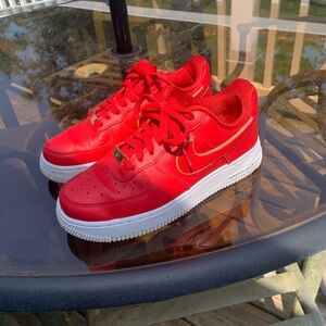 Red Nikes- practically brand new.